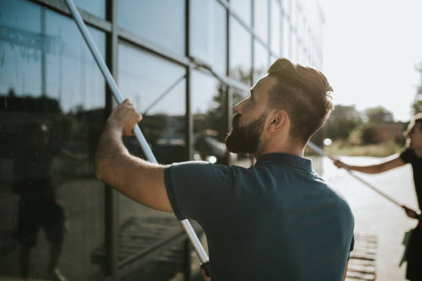 istock Window cleaner on his job 1270437933
