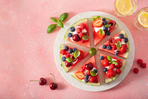 istock watermelon pizza slices with yogurt and berries, summer dessert 1270440496