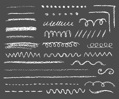 big set of chalk lines and strokes on dark background, variation of shapes and length