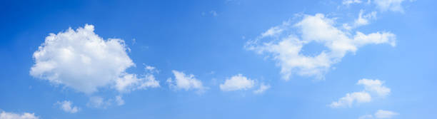istock Panoramic of white clouds on blue sky 1270447609