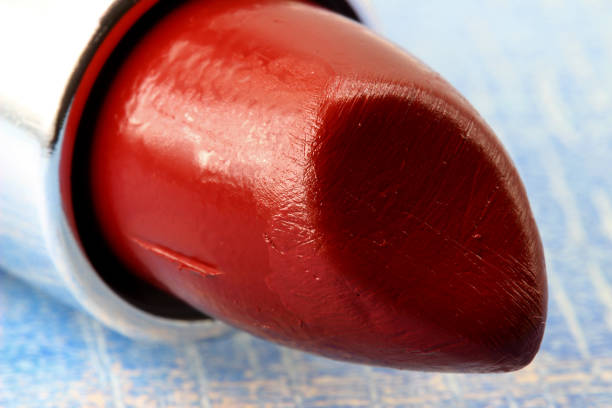 Red lipstick on shiny glittery background