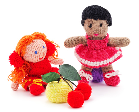 Knitted woolen toys isolated on a white background.