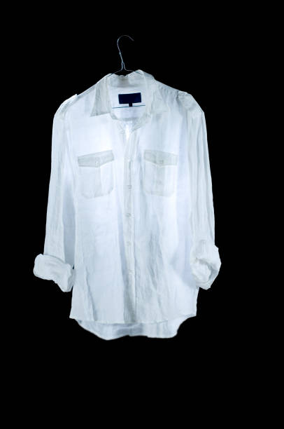 istock Clothes: Blouse white on hanger, on a black background. 1270455620