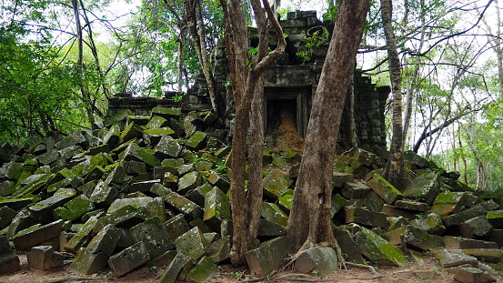 Cambodia Siem Reap－July 27, 2016: Ancient architecture and natural scenery  in Angkor Wat Cambodia. Photo taken in outside area. (Lady temple, Water fall (Phnom Kulen), Beng Mealea temple and Tonle Sap Lake.)