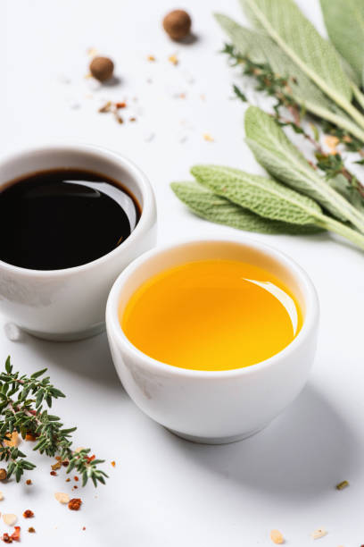 istock Olive oil and balsamic vinegar on a white background. 1270463848