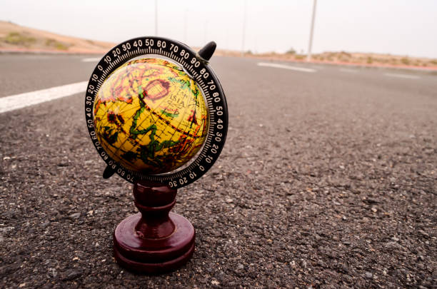 istock Globe Earth on an Asphalt Street 1270464043