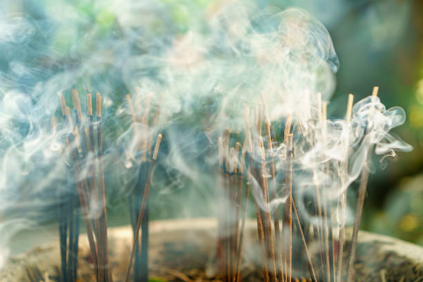 istock burning aromatic incense sticks. Incense for praying hindu and buddha 1270466030
