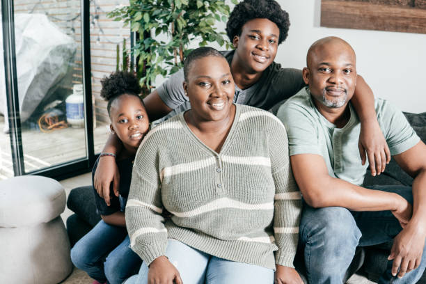 istock Two parents and two kids looking at camera 1270466758