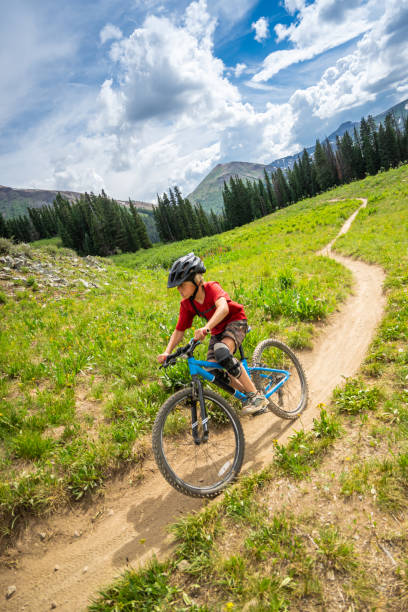istock Kids Mountain Biking in Amazing Beauty 1270468207