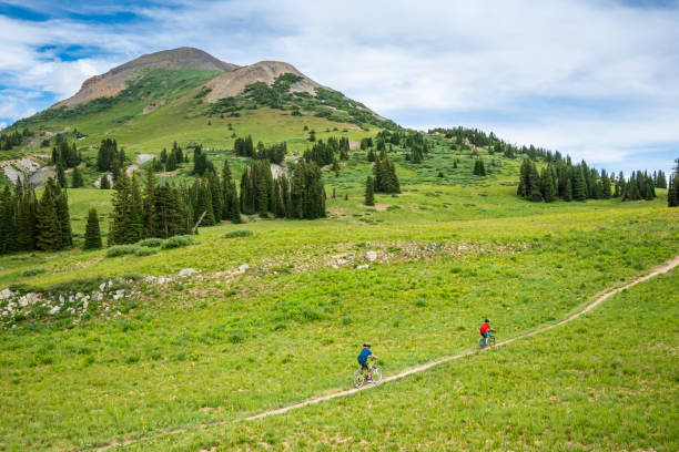 istock Kids Mountain Biking in Amazing Beauty 1270469521