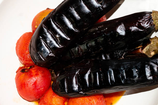 istock Eggplant and tomatoes baked on the grill for the festive table 1270469769