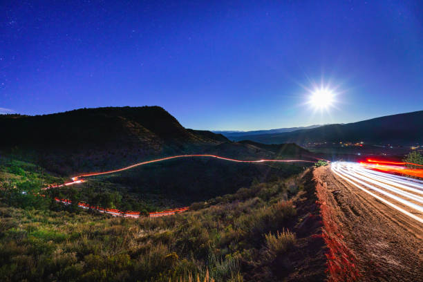 istock Driving Mountain Road at Night 1270471272