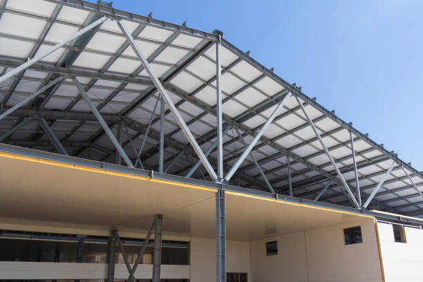 Construction of buildings made of steel structure and sandwich panels. The use of modern building materials Metal frame of the building with a sandwich panel of insulation on the wall. The use of modern building materials sandwich panel photos stock pictures, royalty-free photos & images