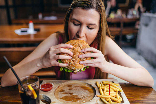istock Young hungry woman 1270476408