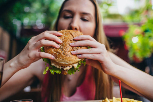 istock Young hungry woman 1270476439