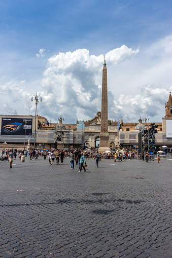 Rome, Italy - 24 june 2018: An Egyptian obelisk of Ramesses II from Heliopolis stands in the centre of the Piazza del Popolo.