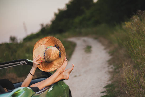 istock Happy couple enjoying in car travelling 1270481442