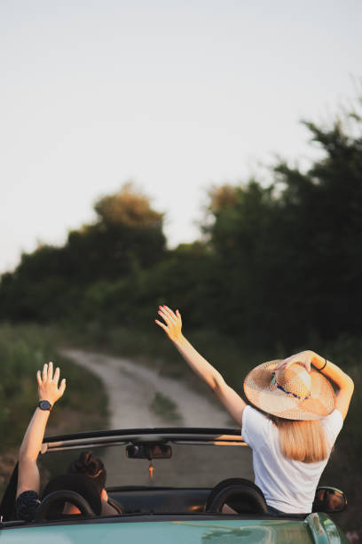istock Happy couple enjoying in car travelling 1270481695