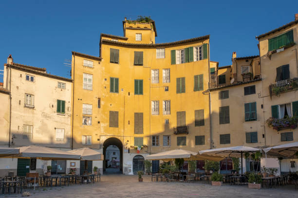 istock Piazza Anfiteatro in Lucca, Tuscany Italy on a sunny day 1270481943