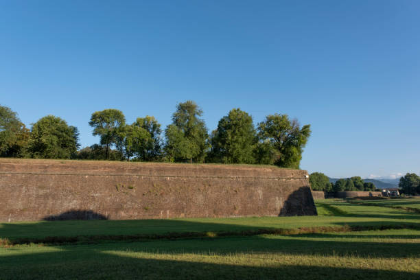 istock Grass in front of the fortress wall in Lucca. 1270481979