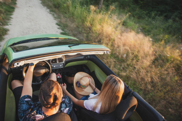 istock Happy couple enjoying in car travelling 1270482612