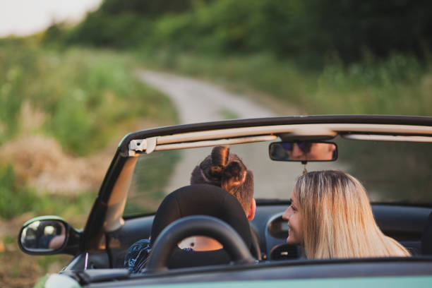 istock Happy couple enjoying in car travelling 1270482648