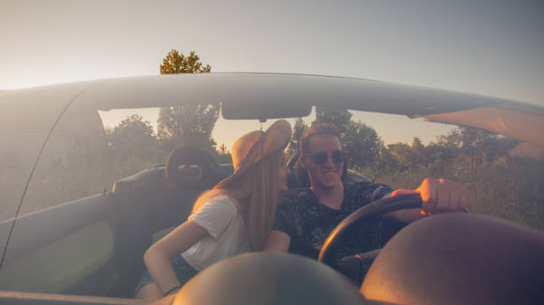 istock Happy couple enjoying in car travelling 1270484524