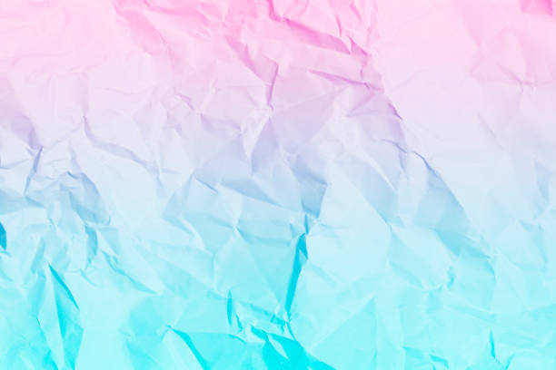 istock blue and pink crumpled paper background, texture for web design screensavers. Template for various purposes or creating packaging. 1270485941