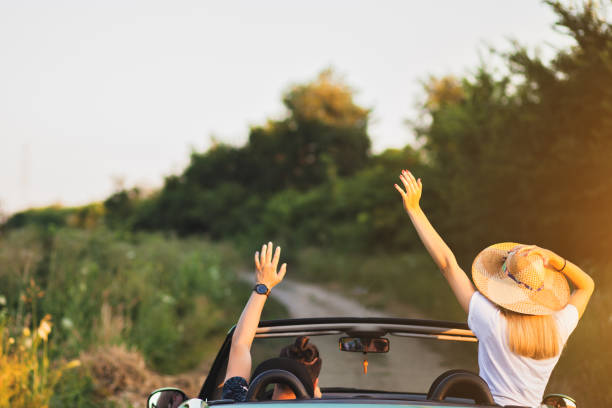istock Happy couple enjoying in car travelling 1270486095