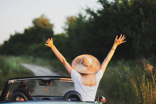 istock Happy couple enjoying in car travelling 1270487024