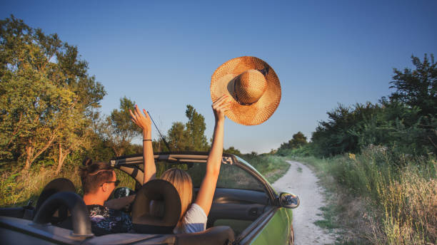istock Happy couple enjoying in car travelling 1270487049