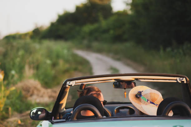 istock Happy couple enjoying in car travelling 1270487129