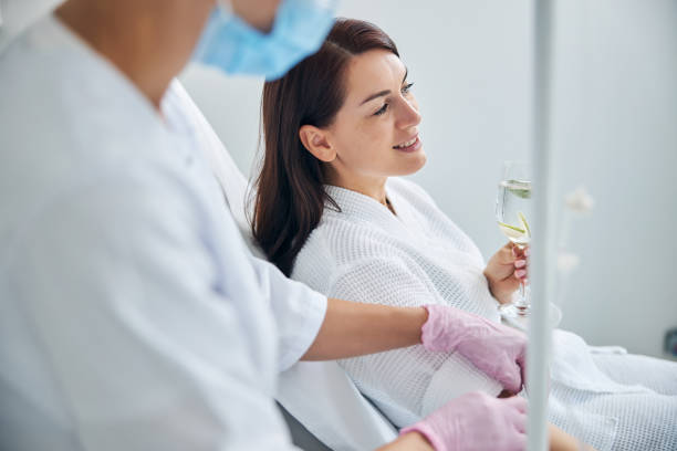 istock Patient smiling during the intravenous vitamin therapy 1270488645