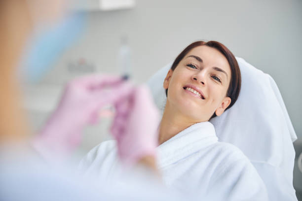 istock Patient in a bathrobe smiling before a medical procedure 1270488815