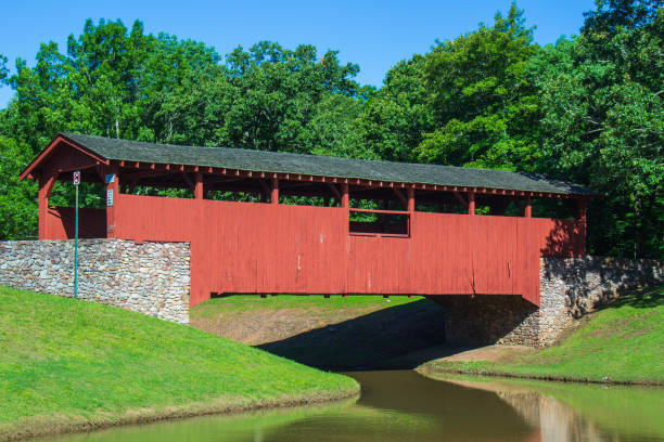 istock Red Wooden covered bridge 1270497755
