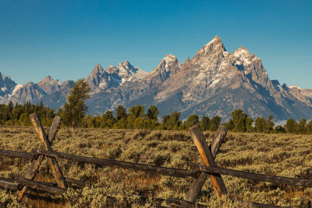 istock Split rail fence frames view of Teton mountains 1270501064