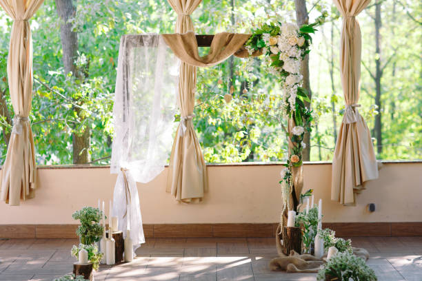 istock Wedding ceremony decorations. White tones of wedding details. 1270501197