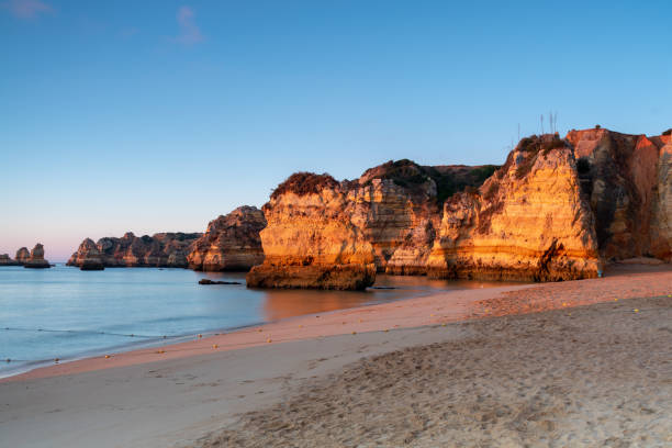 istock Sunrise over beach on the Algarve coast 1270503405