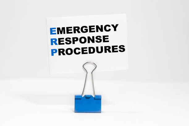 istock EMERGENCY RESPONSE PROCEDURES nscription on a white business card on a white endless background in a blue clip. 1270503461