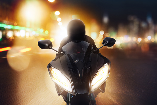 front of a motorcycle at night