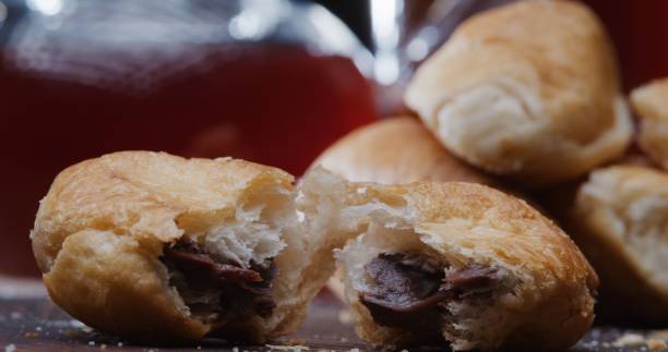 istock Mini croissant with chocolate stuff. Close-up 1270504778