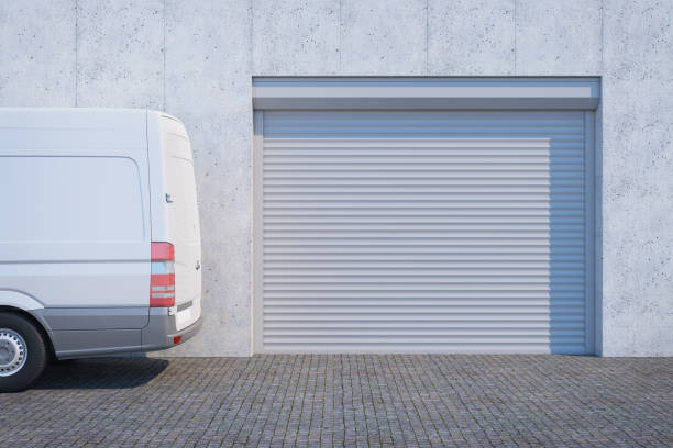 van near the  garage with closed shutter door - vehicle door imagens e fotografias de stock