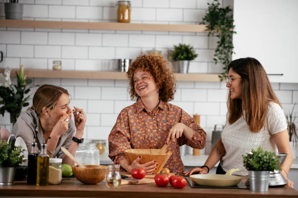 istock Sisters preparing delicious food at home. 1270512198