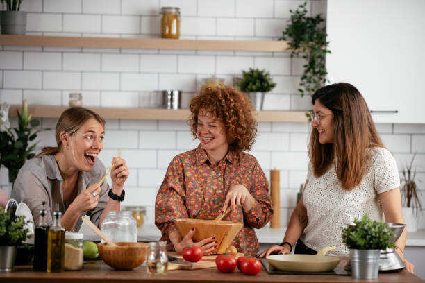istock Sisters preparing delicious food at home. 1270512936