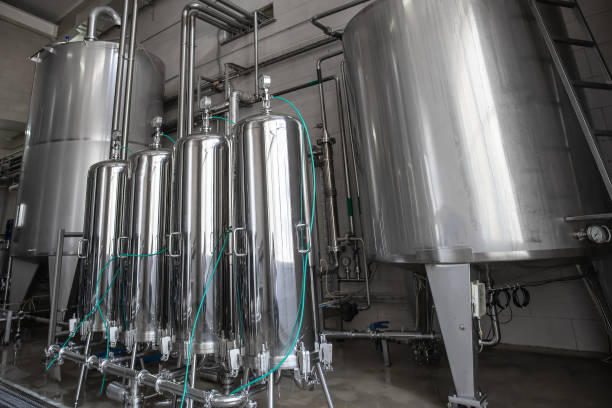 istock Modern Beer and Beverage Factory. Steel tanks with Liquid 1270514021