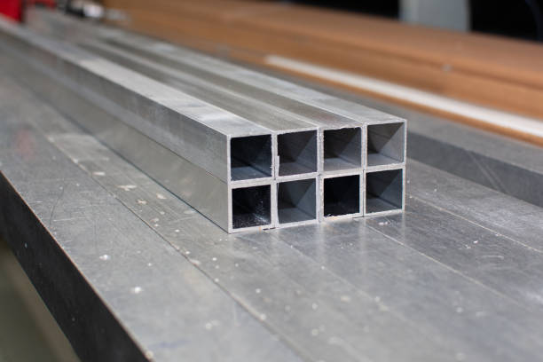 istock The pipe sections. Aluminium profile for manufacturing. Structural metal aluminium shapes. Aluminium profiles texture for constructions. 1270515714