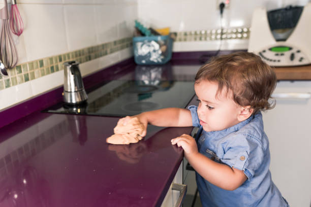 istock Two children preparing pancakes with a kitchen robot. 1270520066