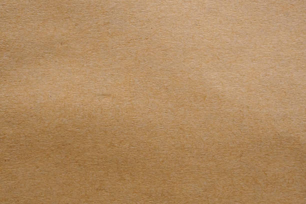 istock Brown paper eco recycled kraft sheet texture cardboard background 1270527960
