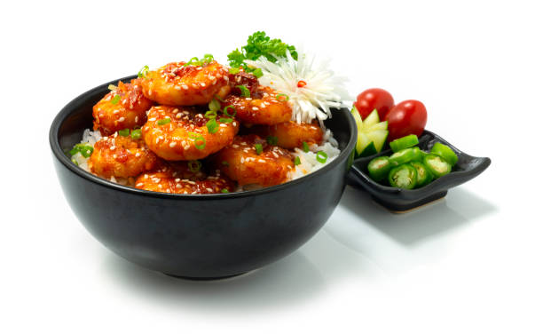 Spicy Korean Shrimps deep fried with rice and chili Sauce Kochujung sprinkle sesame Korean Food stock photo