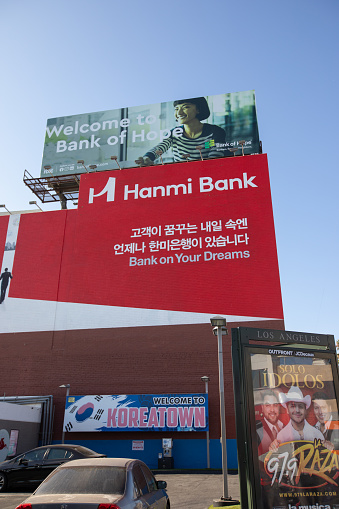 Los Angeles, California, USA  – August 3, 2020: street view of Koreatown Hanmi bank billboard AD in Western Ave and Olympic Blvd